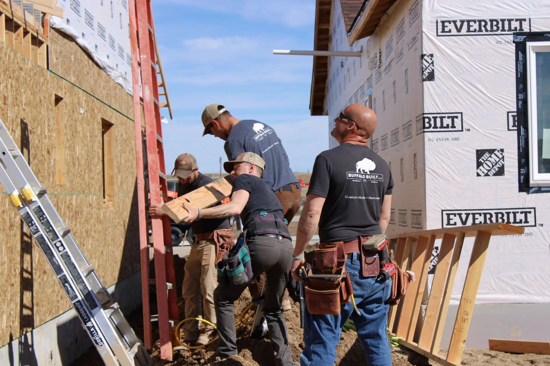 Active framing phase of a residential design build custom home project by Buffalo Built LLC.